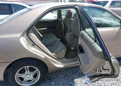 2005 Toyota Camry Le z USA, uszkodzony, nr VIN 4T1BE32K85U080394